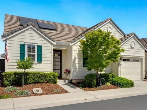 Single-story house with a front garden and a garage