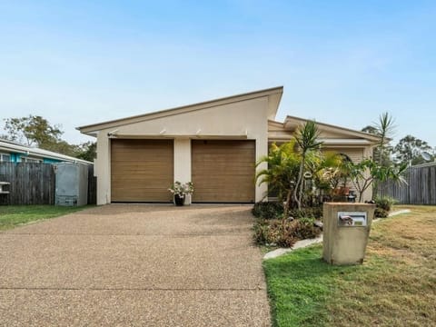 Double garage with a wide driveway