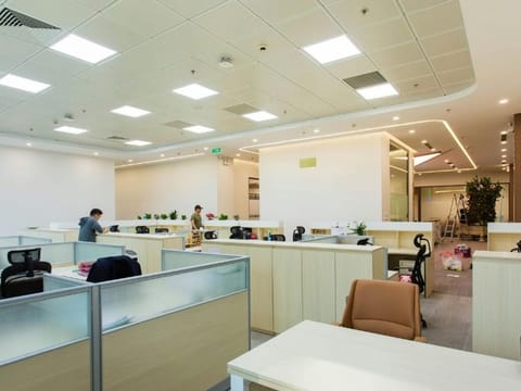 Open-plan office with cubicles and desks